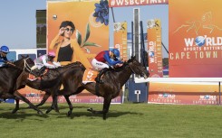 File: The Met is one of South Africa's premier horse races of the season, but is also a highlight on the fashion and social calender in Cape Town. AFP/Rodger Bosch