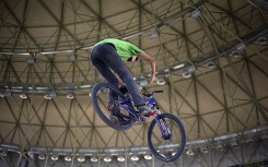 File: A BMX rider performing stunts. Wikimedia Commons/Mostafa Meraji