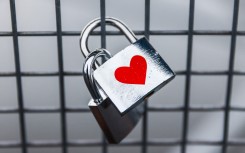 A love padlock is seen at Father Bernatek Footbridge over Vistula River, which is known as the lovers bridge. Krakow, Poland on February 13, 2023. (Photo by Beata Zawrzel/NurPhoto) (Photo by Beata Zawrzel / NurPhoto / NurPhoto via AFP)