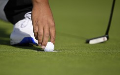 File: A golfer retrieves his ball. Orlando Ramirez/Getty Images via AFP
