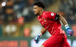 South Africa's goalkeeper #1 Ronwen Williams celebrates after winning at the end of the Africa Cup of Nations (CAN) 2024 quarter-final football match between Cape Verde and South Africa at the Stade Charles Konan Banny in Yamoussoukro on February 3, 2024. 