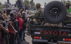 Demonstrators gather to denounce the international community's silence in the face of the perpetual crisis in the East of the Democratic Republic of Congo. AFP/Guerchom Ndebo