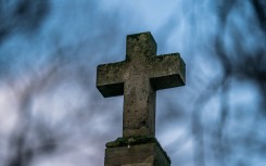 File: Detail of a catholic cross on a grave in the cemetery. Xose Bouzas/Hans Lucas via AFP