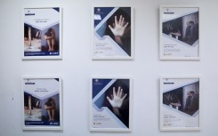 Awareness posters about human trafficking. AFP/Christina Assi