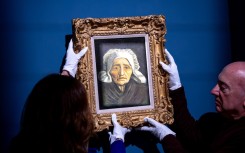 The Van Gogh titled "Tete de paysanne a la coiffe blanche". AFP/Nick Gammon