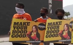 GOOD supporters with placards.