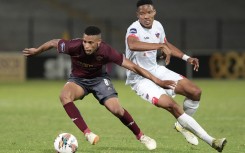 Sihle Nduli of Stellenbosch FC (L) vies for the ball with Elmo Kambindu of Chippa United (R). Nic Bothma/BackpagePix