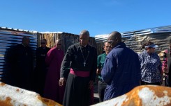 Anglican Archbishop Thabo Makgoba assessing the damage. eNCA/Kevin Brandt
