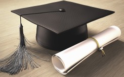 File: A university graduation cap and degree. KTS/Science Photo Library via AFP