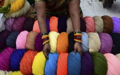 File: A vendor arranges wool yarns. AFP/Sam Panthaky