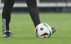 File: A soccer player practicing with a ball. AFP/Bruno Fahy/Belga Mag