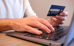 File: A person accessing his online banking portal. Nicolas Guyonnet/Hans Lucas via AFP