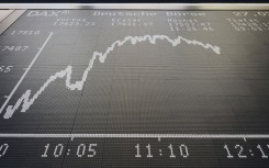 File: A display showing a stock market index. AFP/Daniel Roland