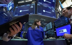 Traders work on the floor of the New York Stock Exchange. AFP/Timothy A Clary