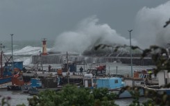 Large waves and strong winds battered Kalk Bay harbour. Brenton Geach/Gallo Images via Getty Images