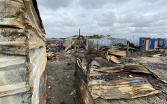 Fire victims at three informal settlements in Cape Town are now trying to rebuild their lives. eNCA/Kevin Brandt