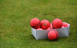 File: A box of used pink cricket balls are pictured on a pitch. AFP/Paul Ellis