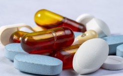 File: A close up on drug tablets and capsules. Frederic Moreau/Hans Lucas via AFP