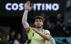 Spain's Carlos Alcaraz gestures after losing against Russia's Andrey Rublev. AFP/Thomas Coex
