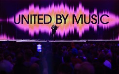 Senior Floor Manager Henric von Zweigbergk on the stage. AFP/Andres Hillergren/Sweden Out