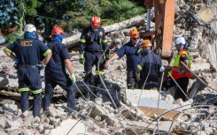 Search and rescue operations continue at the Neo Victoria apartment building. Jaco Marais/Die Burger/Gallo Images via Getty Images