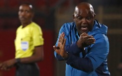 File:  Pitso Mosimane reacts during the CAF Champions League semi-final match between Egypt's al-Ahly and Algeria's ES Setif at the al-Salam stadium in Cairo on May 7, 2022.