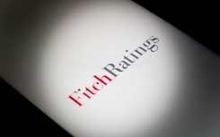 File: The Fitch Ratings logo. Nikolas Kokovlis/ NurPhoto via AFP
