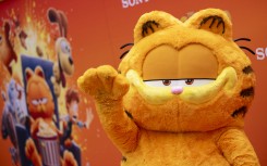 Cartoon character Garfield poses as he attends the premiere of "The Garfield" movie. AFP/Etienne Laurent.jpg