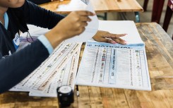 official prepares ballot papers