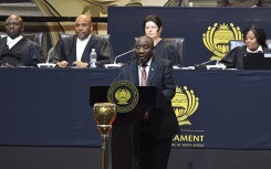 President Cyril Ramaphosa addresses Members of Parliament. AFP/Rodger Bosch