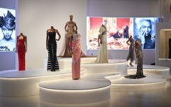 Dresses are displayed during a press preview for the "Naomi" exhibition. AFP/Justin Tallis