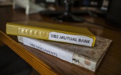 File: Files containing paperwork of VBS Mutual Bank. AFP/Gulshan Khan
