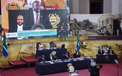 President Cyril Ramaphosa delivers the OPA at the Cape Town City Hall. AFP/Rodger Bosch
