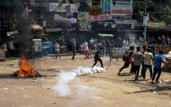 Anti-quota protesters clash with the police in Dhaka. AFP