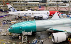 A Boeing 777 (front) and a 787-9 Dreamliner are under production at the Boeing Everett Production Facility in Everett, Washington. AFP/Jennifer Buchanan