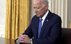 US President Joe Biden pauses before addressing the nation about his decision to not seek reelection. AFP/Pool