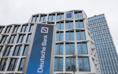 View of the Postbank headquarters with the Deutsche Bank logo. Rolf Vennenbernd/dpa Picture-Alliance via AFP