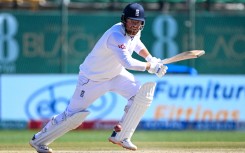 File: England's Jonny Bairstow watches the ball after playing a shot. AFP/Sajjad Hussain