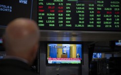 Traders on the floor of the New York Stock Exchange. AFP/Angela Weiss