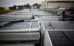 File: Piles of worn-out solar panels. AFP/Christophe Archambault