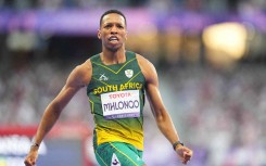Mpumelelo Mhlongo of South Africa celebrates winning gold in Men's 100m - T44 Final. lrik Pedersen/NurPhoto via AFP
