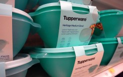 File: Tupperware products are offered for sale at a retail store. AFP/Scott Olson/Getty Images