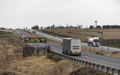 File: A general view shows a digital road sign displaying a warning message on the Van Reenen's Pass. AFP/Wikus de Wet