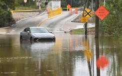 A car in a flooded street is seen after Hurricane Helene made landfall in Atlanta, Georgia. AFP/Richard Pierrin