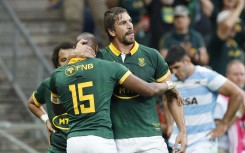 Aphelele Fassi celebrates after scoring the team's third try with Eben Etzebeth. AFP/Phill Magakoe