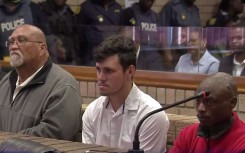 Zachariah Olivier, Rudolph De Wet and William Musoro in court. eNCA