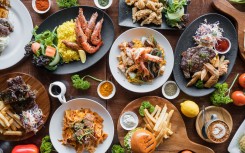 File: Different dishes of food spread on table. GettyImages/nazar_ab