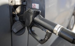 File: Illustration picture shows filling diesel in a car at a filling station.