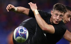 New Zealand's scrum-half Cam Roigard passes the ball out of a scrum. AFP/Anne-Christine Poujoulat