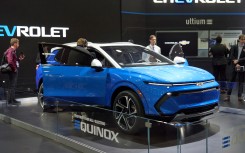 the Chevy Equinox EV at the North American International Auto Show in Detroit. AFP/Geoff Robins